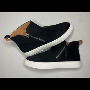 J. Crew black suede hi-top bootie with zipper and white sole.